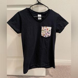 Disney pocket v-neck tee. Size Medium.